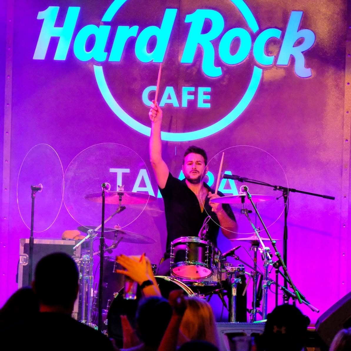 Josh Naaman drumming on stage at the Hard Rock Cafe in Tampa